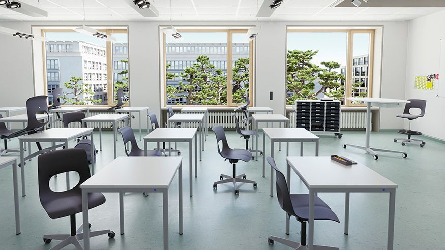 Une salle de classe avec des tables scolaires et la chaise pivotante pour élèves NF-Move de VS