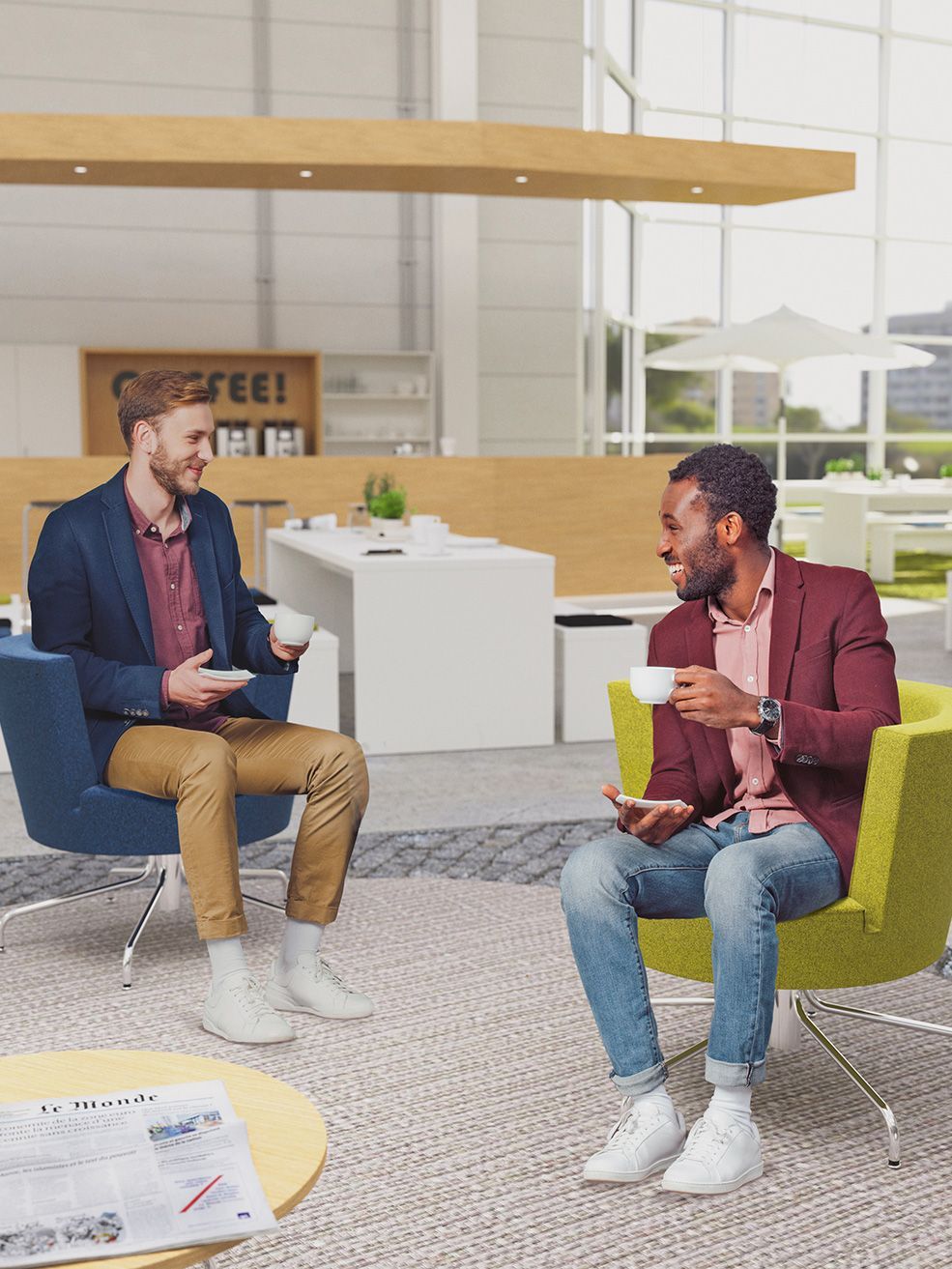 Two men sit with a cup of coffee on low-back armchairs by VS and are having a chat.