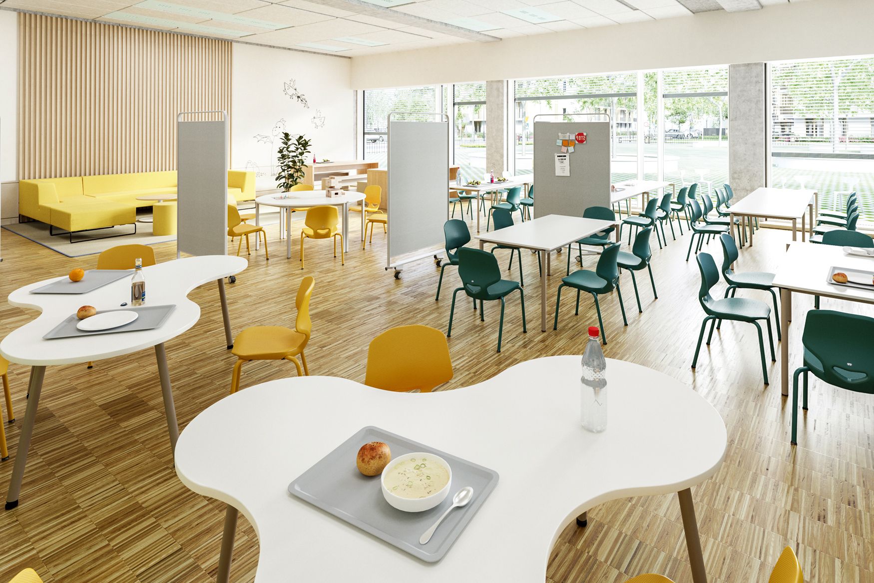 School cafeteria featuring curved, free-form tables, yellow and green student chairs, sofas, and mobile acoustic partitions by VS