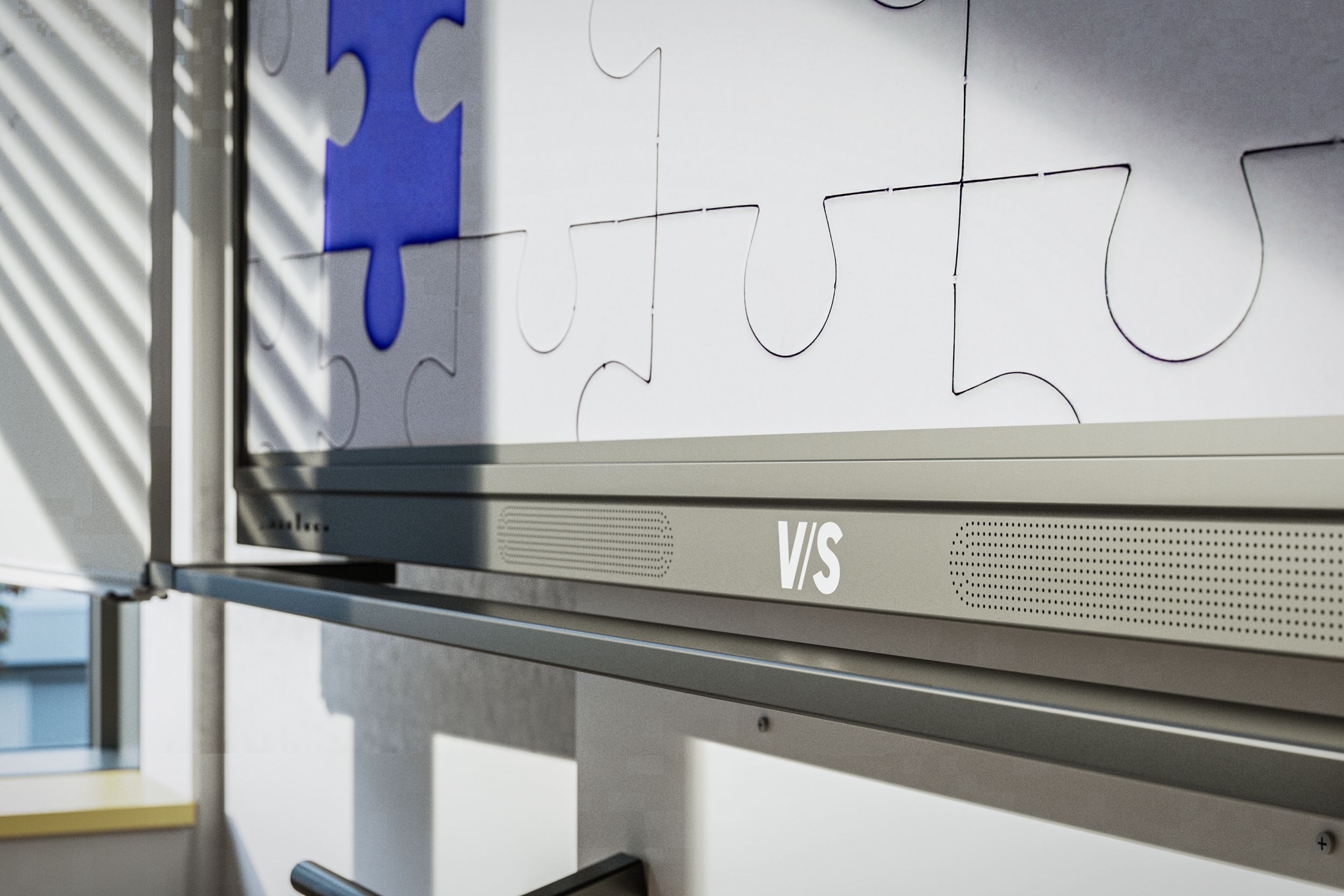 Detail of a display showing puzzle pieces