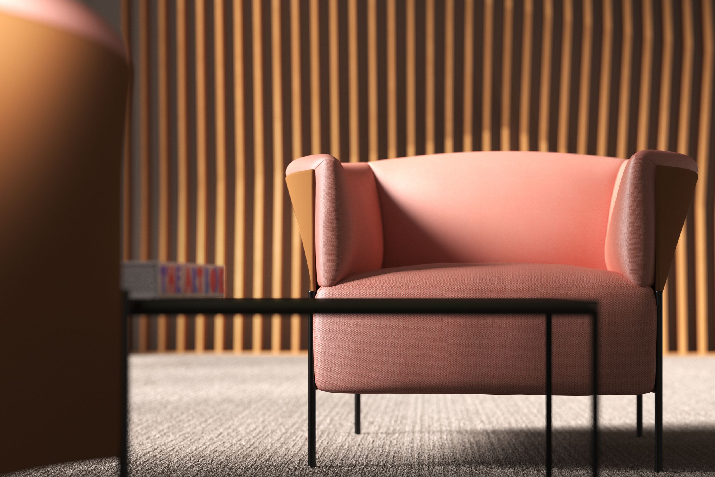 A lounge chair with a salmon-coloured fabric cover in front of a wooden slatted wall
