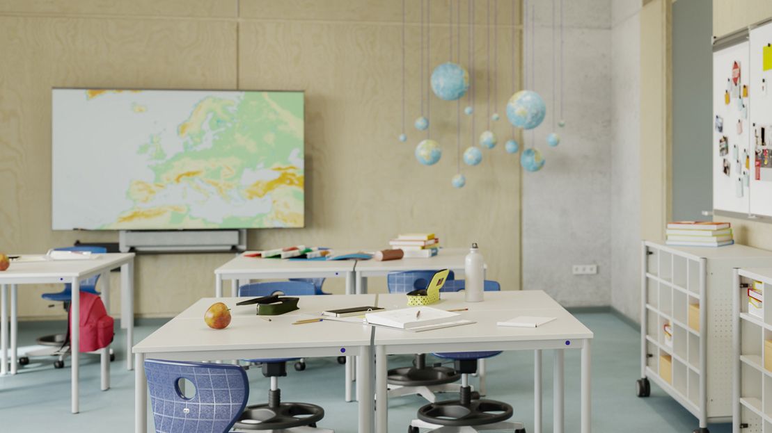 Classrooms equipped with free-form skid-base tables and height-adjustable swivel student chairs with a base for all age groups