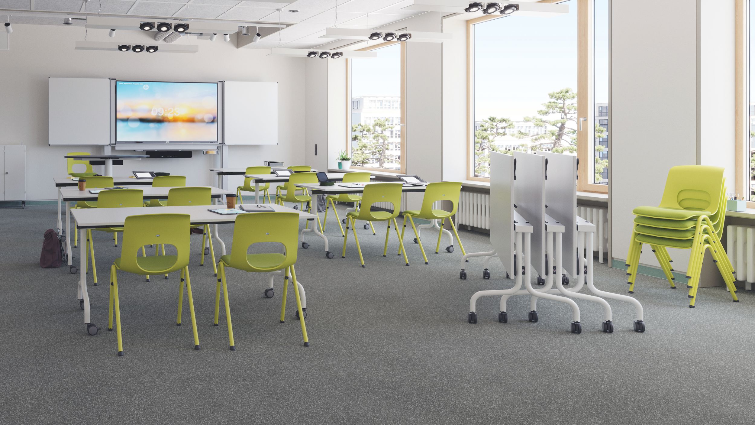 Modernes Klassenzimmer mit den hochklappbaren Tischen FlipTable, den gepolsterten, stapelbaren Schülerstühlen NF-Compass und einem interaktiven Whiteboard MediaPilon von VS
