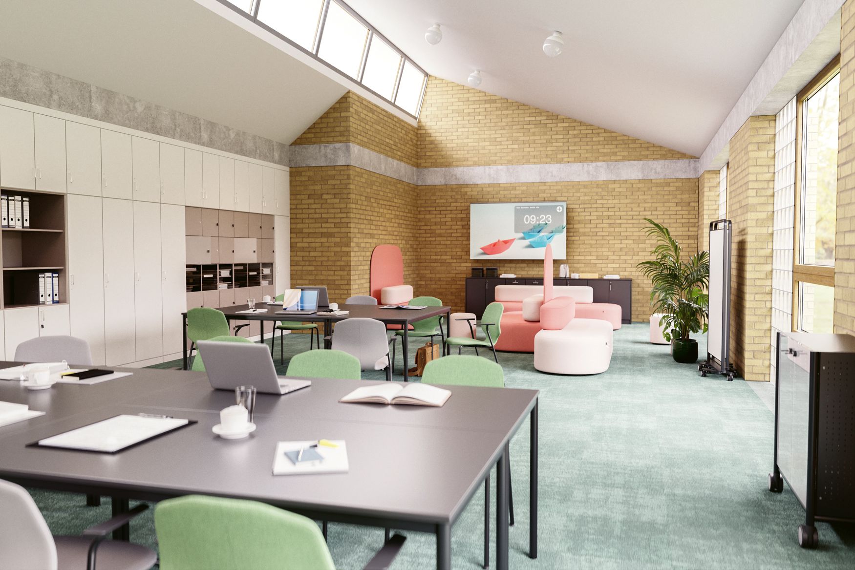 Team area for teachers featuring EcoTable desks, JUMPER chairs, Revo upholstered elements, LinkUp partition walls, and Series 800 cabinets from VS