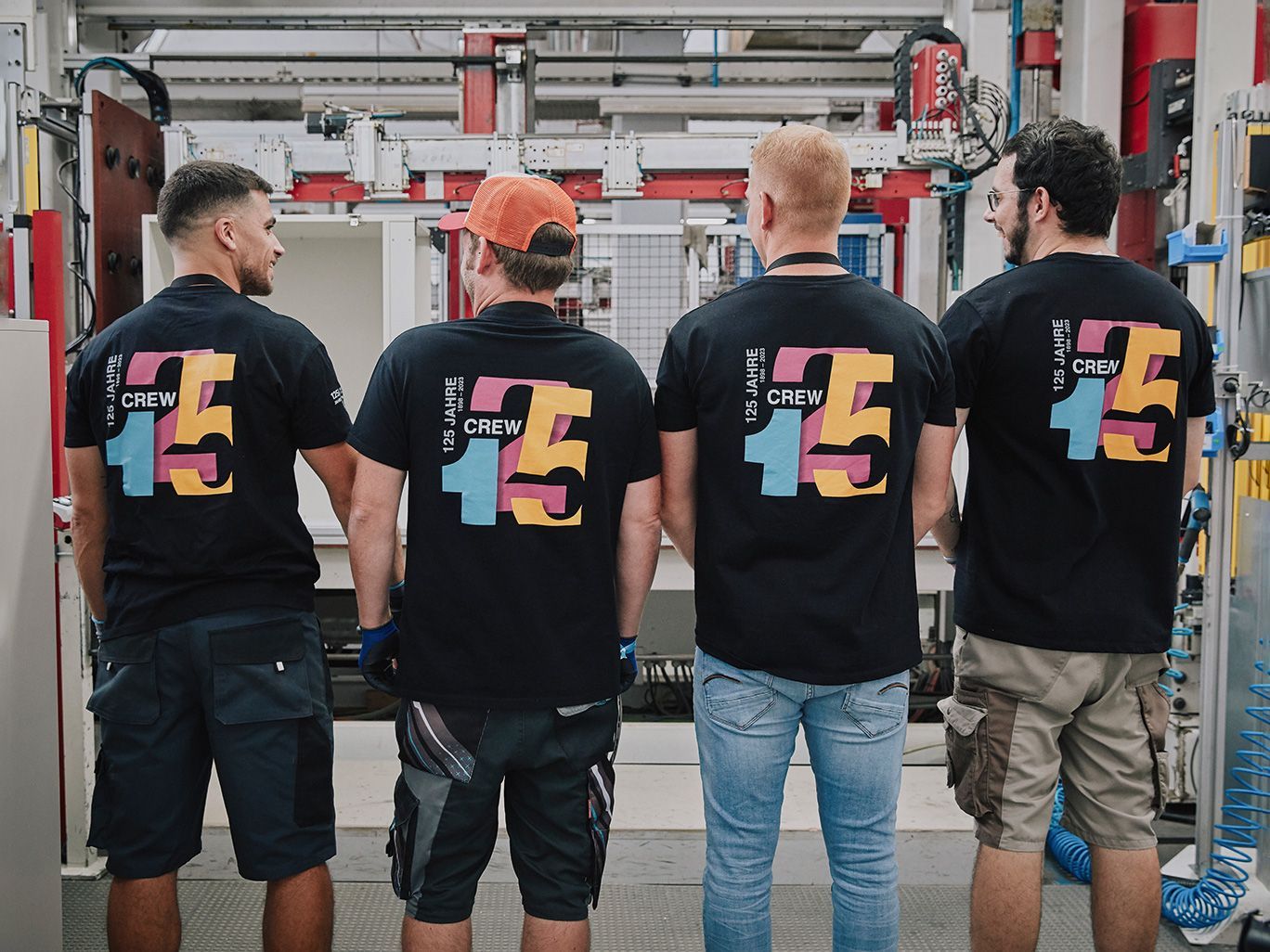 VS crew in matching 125th anniversary shirts at the VS Open Day