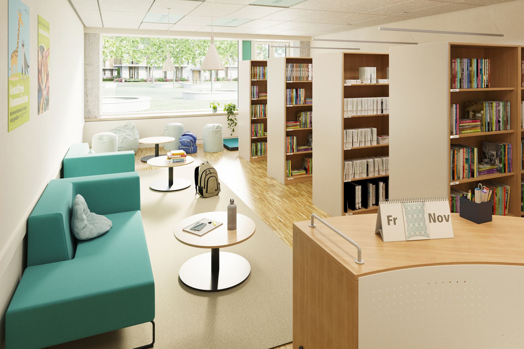 Schulbibliothek mit türkisen Sofas, Sitzsäcken, Bücherregalen und Ausleihtresen von VS