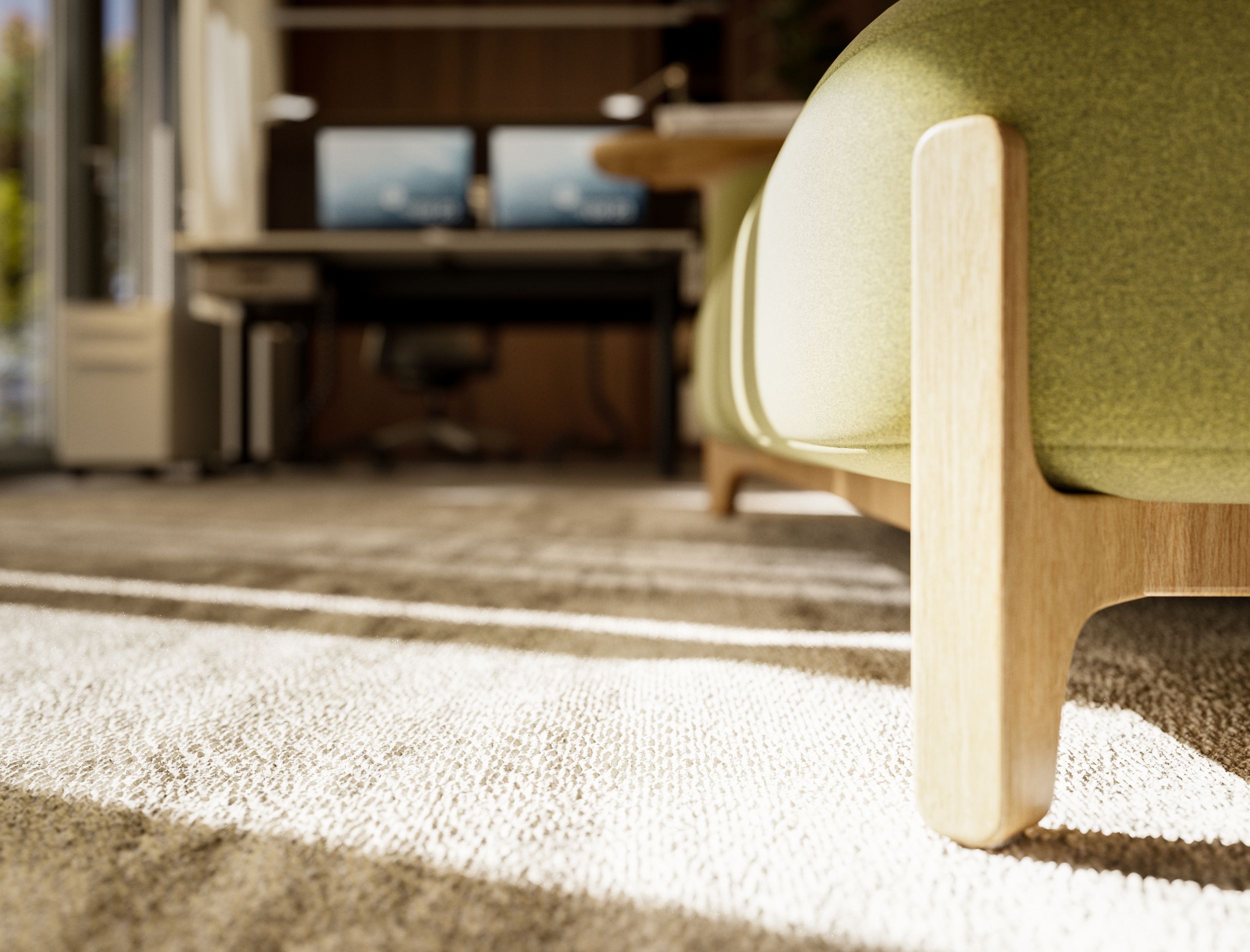 Close-up of a modern wooden frame from the Sabot upholstered furniture series. The frame creates a contrast with the green upholstery fabric.