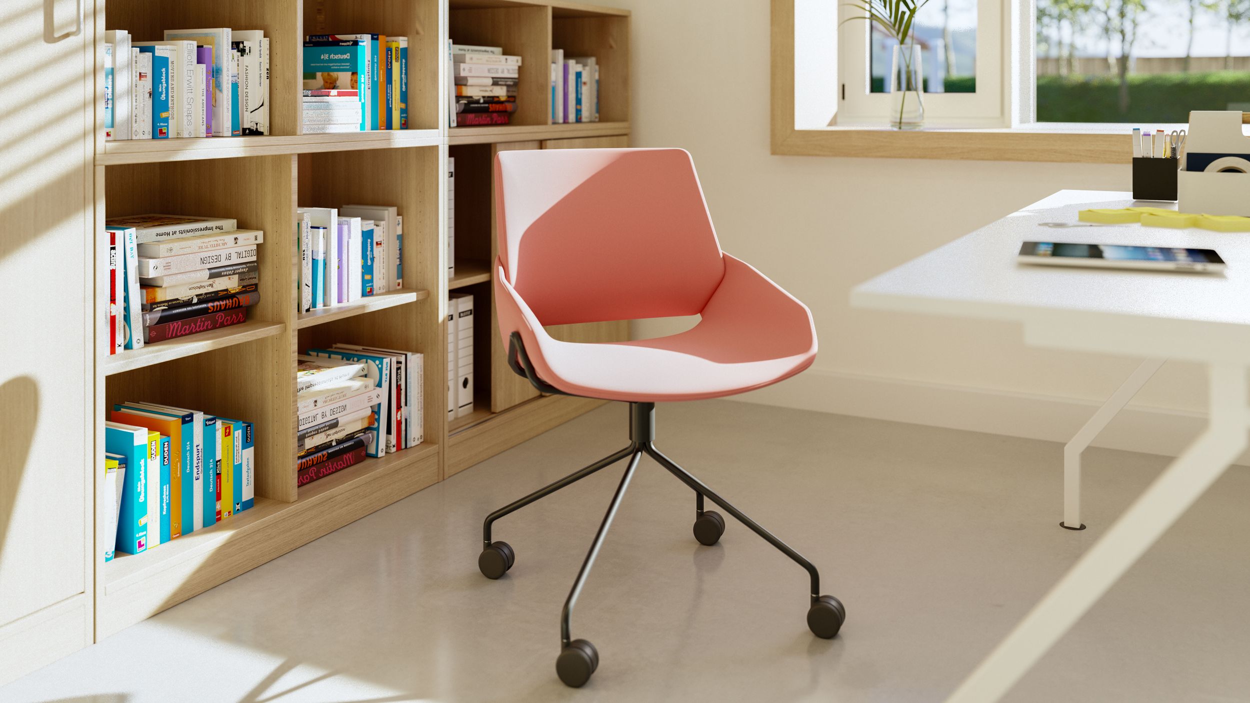 Prostoria Monk wheelchair in pink in front of a bookcase