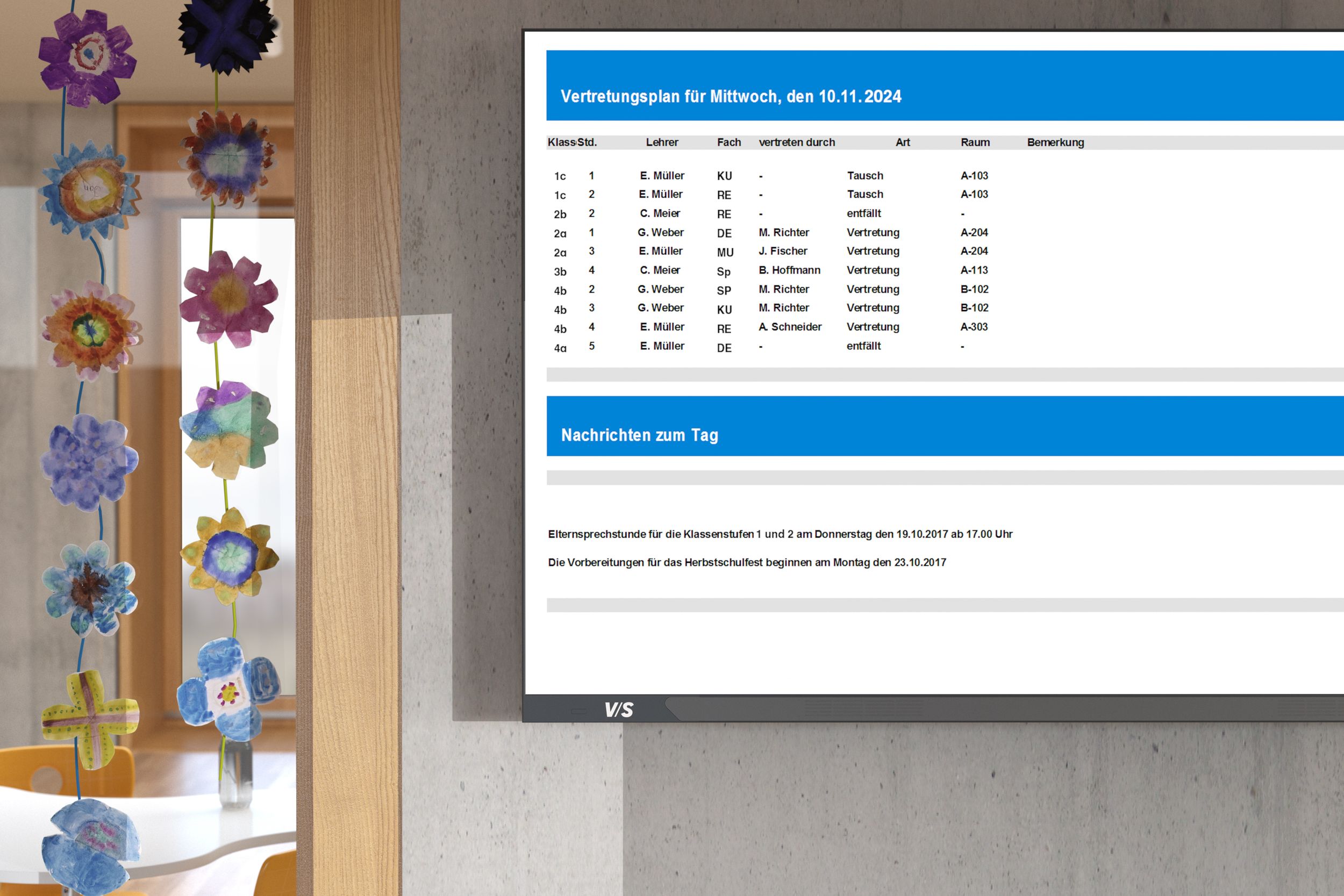 The VS SIGN display shows a substitute teacher schedule in the school hallway—a clearly visible information display for high-traffic areas.