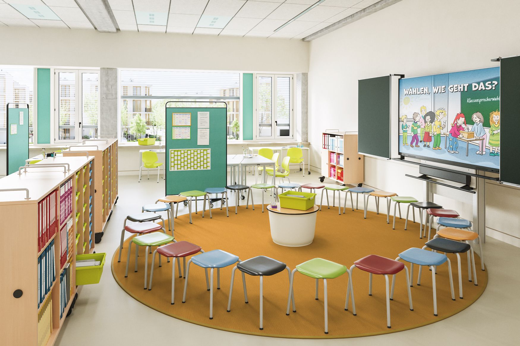 A flexible elementary school learning space based on the Churer model, featuring colorful stools arranged in a circle, mobile shelving units, a portable bulletin board, and an interactive display from VS