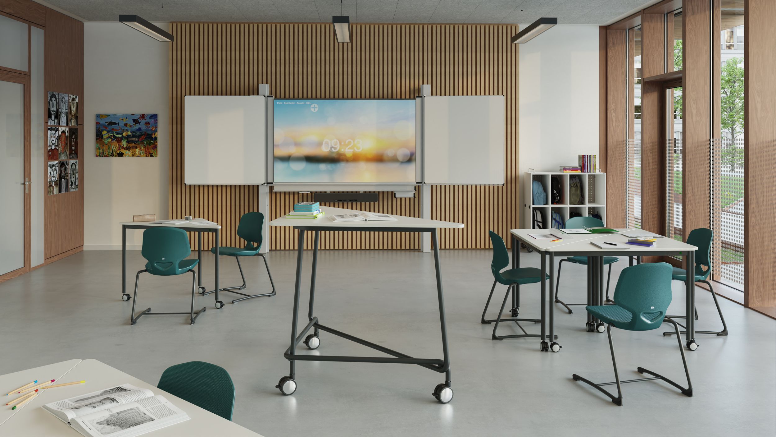 Salle de classe moderne équipée d'un écran avec réglage en hauteur MediaPilon et contrepoids.