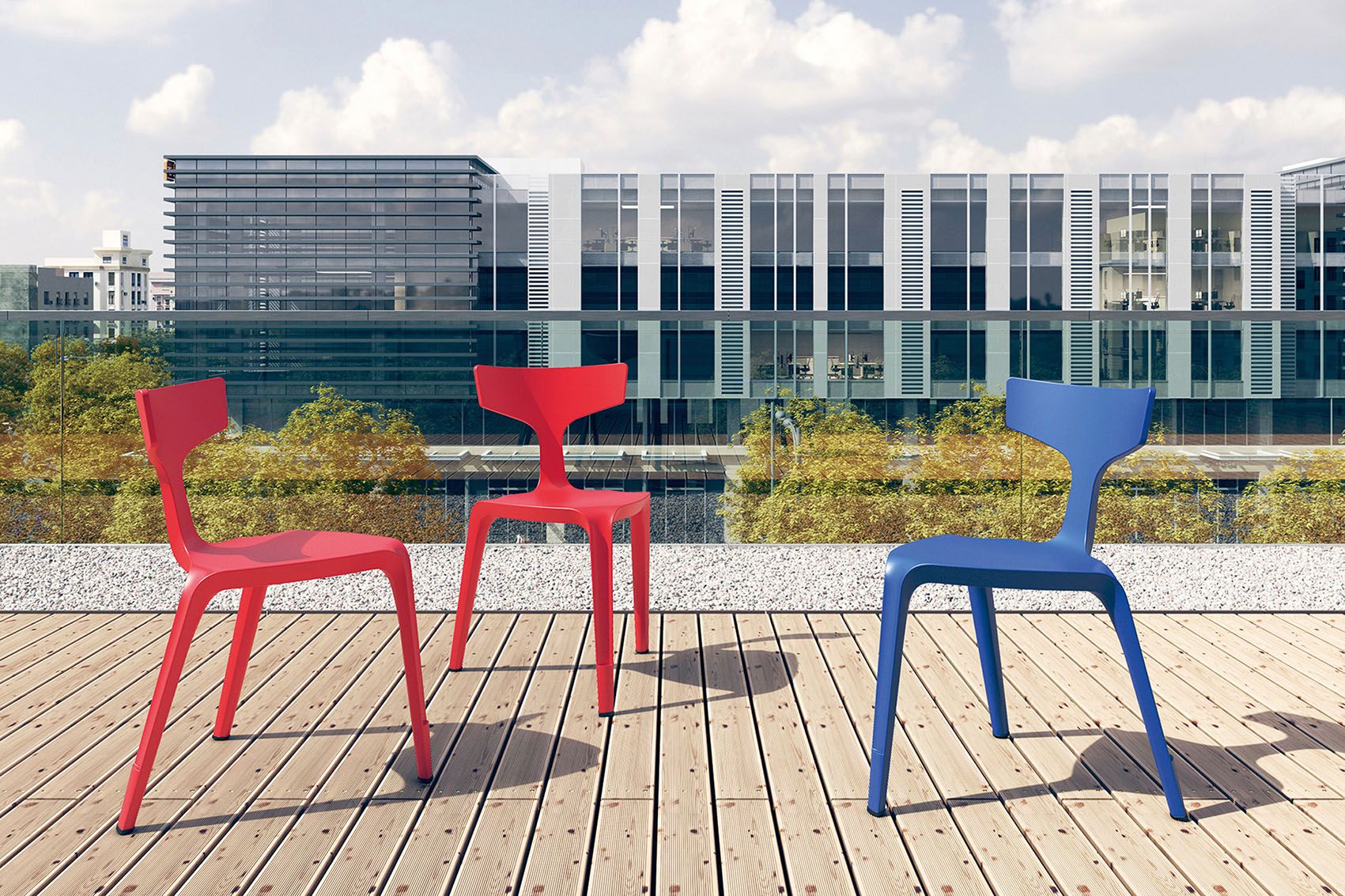 Three VS chairs Stakki are standing outside on a terrace