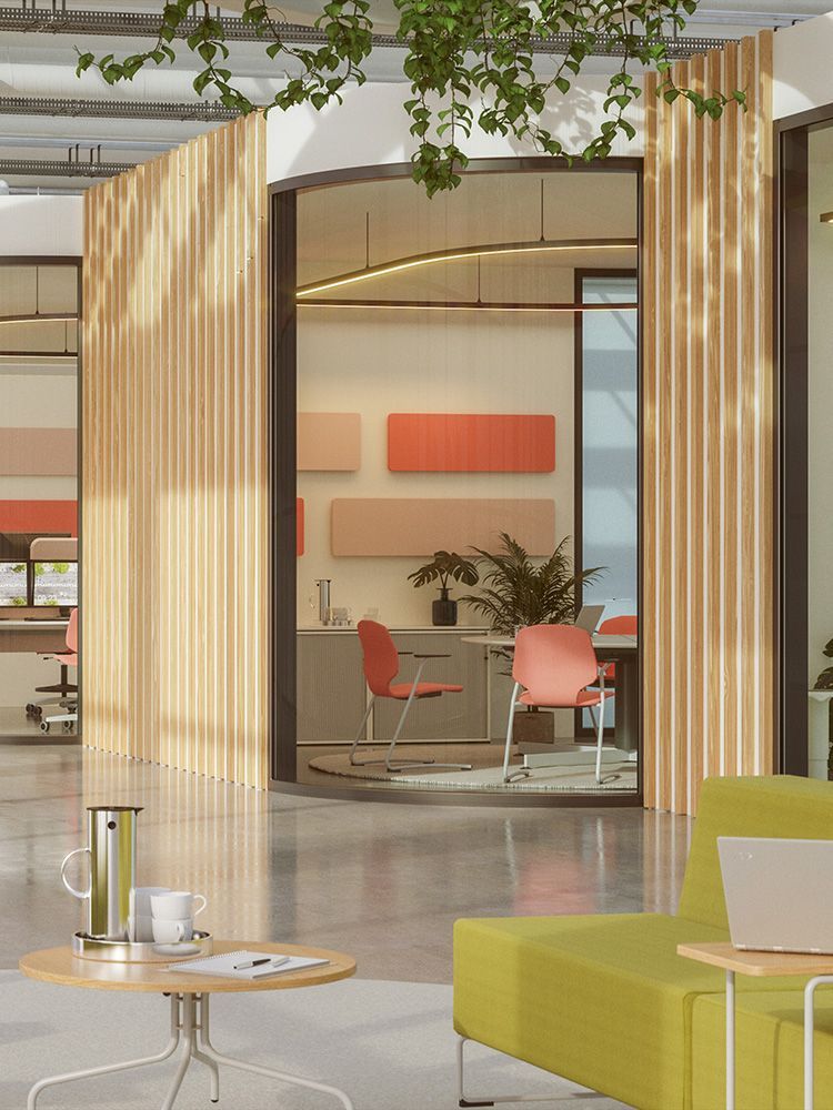 Showroom with various VS furniture such as the LowBack sofa with side table, an interactive whiteboard with a lectern and a meeting table with JUMPER chairs